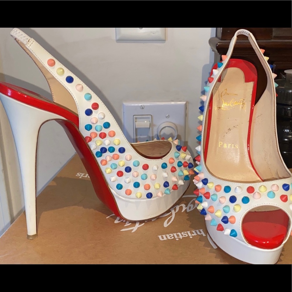 Christian louboutins. White